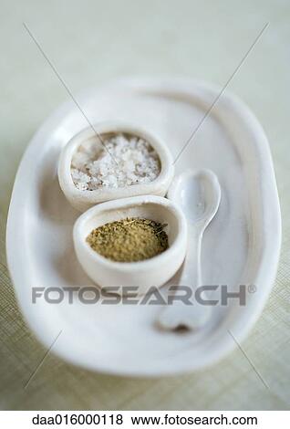 Salt and pepper dishes with spoon View Large Photo Image Stock Photo - Salt and pepper dishes with spoon. Fotosearch