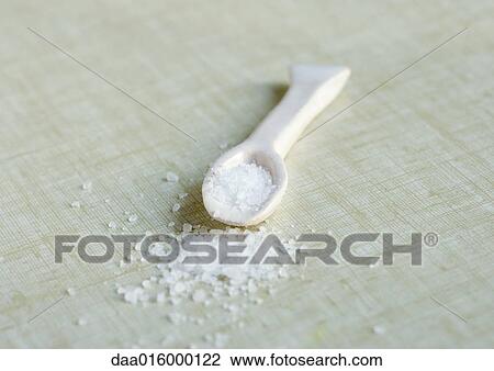 Salt spilling out of spoon View Large Photo Image Stock Image - Salt spilling out of spoon. Fotosearch