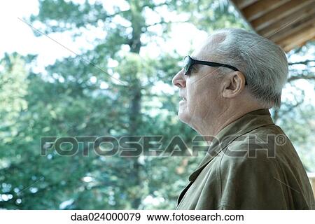 Senior man, side view View Large Photo Image Stock Photo - Senior man, side view. Fotosearch