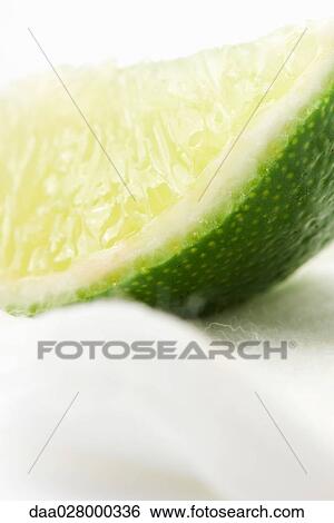 Stock Photograph - Slice of lime, close-up. Fotosearch