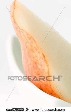 Slice of pear, close-up View Large Photo Image Picture - Slice of pear, close-up. Fotosearch