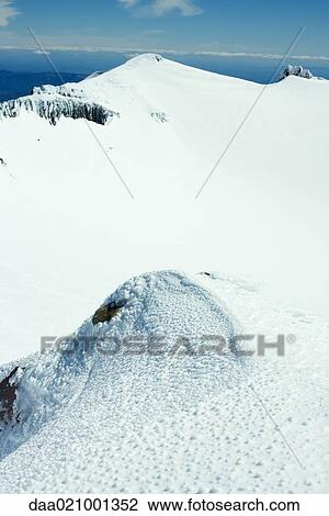 Snow-covered mountainous landscape View Large Photo Image Stock Image - Snow-covered mountainous landscape. Fotosearch