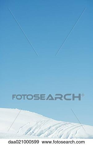 Snow-covered slope View Large Photo Image Stock Photo - Snow-covered slope. Fotosearch