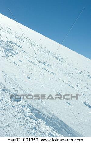 Snow-covered slope View Large Photo Image Stock Photo - Snow-covered slope. Fotosearch