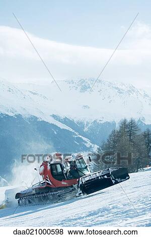 Snowplough on mountain slope View Large Photo Image Stock Photo - Snowplough on mountain slope. Fotosearch