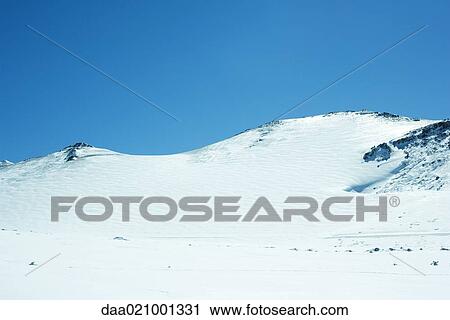 Snowy mountain landscape View Large Photo Image Stock Image - Snowy mountain landscape. Fotosearch