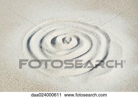 Spiral shape drawn in sand, view from directly above View Large Photo Image Stock Image - Spiral shape drawn in sand, view from directly above. Fotosearch