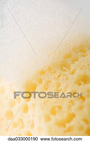Sponge and soap suds, extreme close-up View Large Photo Image Stock Image - Sponge and soap suds, extreme close-up. Fotosearch