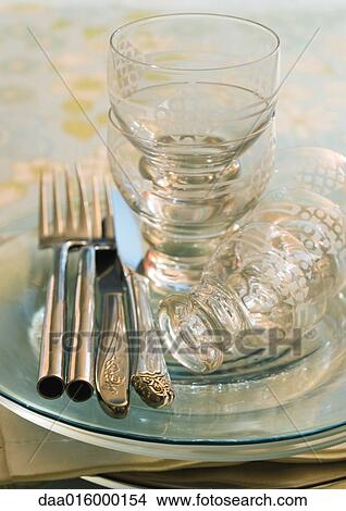 Stack of clean dishes on table View Large Photo Image Picture - Stack of clean dishes on table. Fotosearch