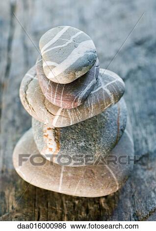 Stack of pebbles View Large Photo Image Stock Photograph - Stack of pebbles. Fotosearch