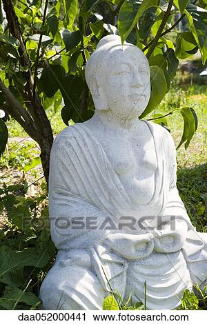 Statue of Buddha outdoors View Large Photo Image Stock Image - Statue of Buddha outdoors. Fotosearch