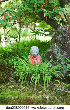 Statuette in ornamental garden View Large Photo Image Stock Photography - Statuette in ornamental garden. Fotosearch