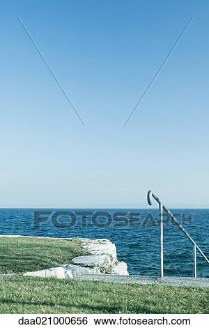Steps leading to lake View Large Photo Image Stock Photograph - Steps leading to lake. Fotosearch