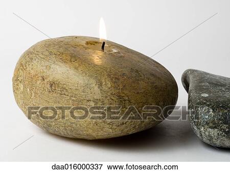 Stone-shaped candle View Large Photo Image Stock Photo - Stone-shaped candle. Fotosearch