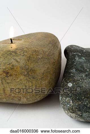 Stone-shaped candle View Large Photo Image Stock Photograph - Stone-shaped candle. Fotosearch