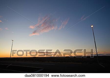 Picture - Sun setting over airport runway, Keflavik, Iceland. Fotosearch
