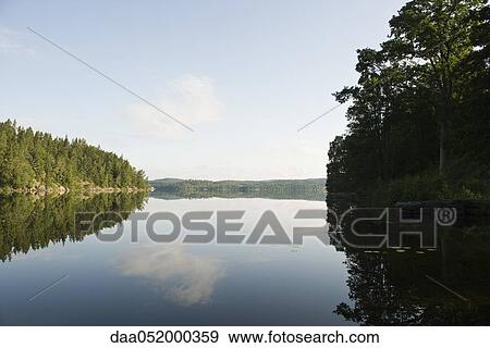 Sweden, tranquil lake scene View Large Photo Image Stock Photo - Sweden, tranquil lake scene. Fotosearch
