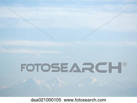 Switzerland, mountain landscape in distance View Large Photo Image Stock Photography - Switzerland, mountain landscape in distance. Fotosearch