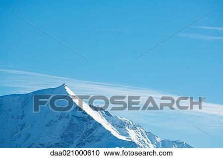Stock Image - Switzerland, mountain peak. Fotosearch