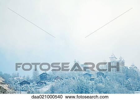 Switzerland, Vaud canton, Lavaux region, snowy mountain landscape with castle View Large Photo Image Stock Image - Switzerland, Vaud canton, Lavaux region, snowy mountain landscape with castle. Fotosearch