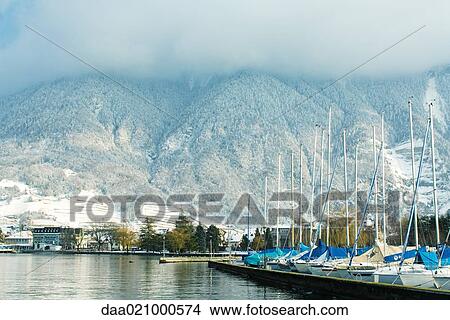 Switzerland, Vaud canton, town of Villeneuve, harbor on Lake Geneva View Large Photo Image Picture - Switzerland, Vaud canton, town of Villeneuve, harbor on Lake Geneva. Fotosearch