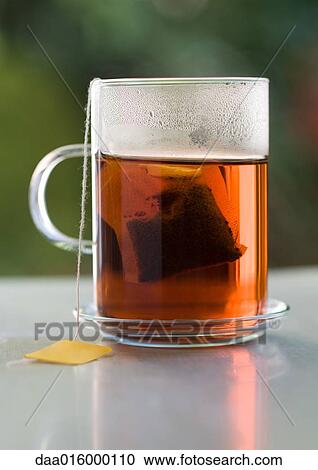 Teabag steeping in mug View Large Photo Image Stock Image - Teabag steeping in mug. Fotosearch