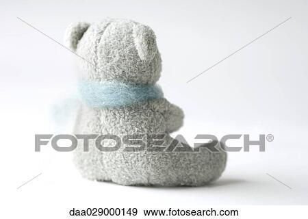 Teddy bear wearing wool scarf, rear view View Large Photo Image Stock Photo - Teddy bear wearing wool scarf, rear view. Fotosearch