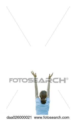 Teenage girl with arms raised, rear view View Large Photo Image Stock Image - Teenage girl with arms raised, rear view. Fotosearch
