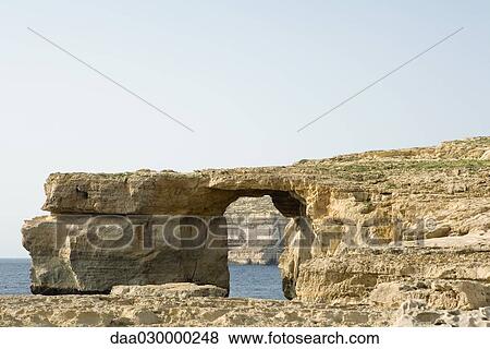 The Azure window, a natural bridge on the island of Gozo, Malta View Large Photo Image Stock Photo - The Azure window, a natural bridge on the island of Gozo, Malta. Fotosearch