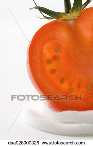 Tomato half and cotton cosmetic pads View Large Photo Image Stock Photograph - Tomato half and cotton cosmetic pads. Fotosearch