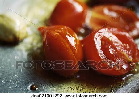 Tomatoes in oil View Large Photo Image Stock Image - Tomatoes in oil. Fotosearch