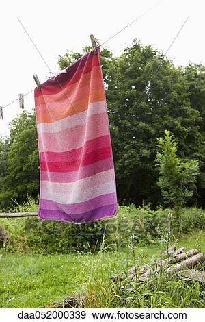Towel drying on clothes-line View Large Photo Image Stock Photo - Towel drying on clothes-line. Fotosearch