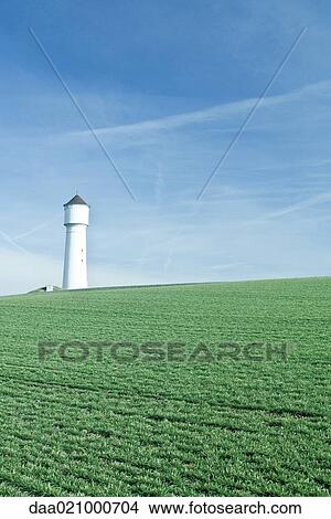 Tower in green field View Large Photo Image Picture - Tower in green field. Fotosearch