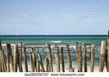 Stock Photo - Tranquil beach scene. Fotosearch