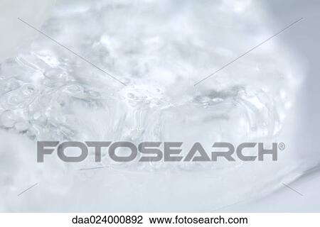 Stock Image - Transparent substance, extreme close-up. Fotosearch