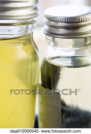 Stock Photography - Two bottle of oils. Fotosearch