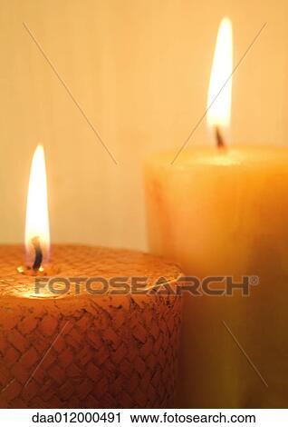 Two lit candles View Large Photo Image Stock Image - Two lit candles. Fotosearch