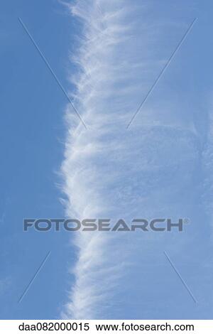 Vapor trail in blue sky View Large Photo Image Stock Photography - Vapor trail in blue sky. Fotosearch