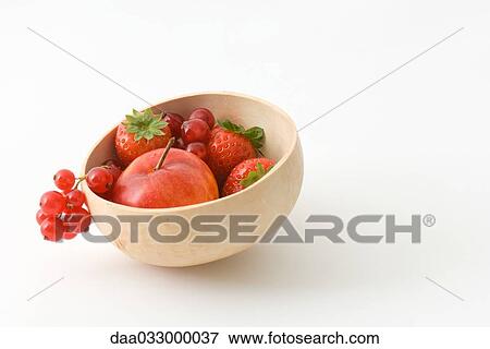 Variety of fruit in a wooden bowl View Large Photo Image Stock Photo - Variety of fruit in a wooden bowl. Fotosearch