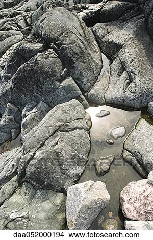 Water pooled on rocks View Large Photo Image Picture - Water pooled on rocks. Fotosearch