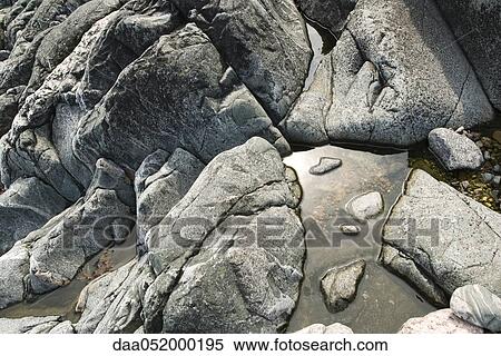 Water pooled on rocks View Large Photo Image Stock Photography - Water pooled on rocks. Fotosearch