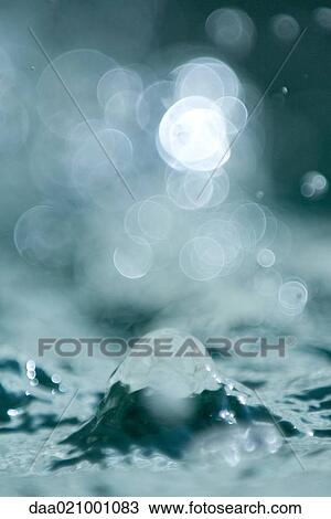 Stock Image - Water splashing, extreme close-up. Fotosearch
