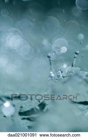 Stock Image - Water splashing, extreme close-up. Fotosearch