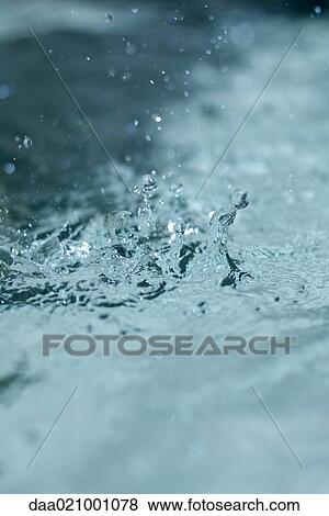 Stock Photo - Water splashing, extreme close-up. Fotosearch