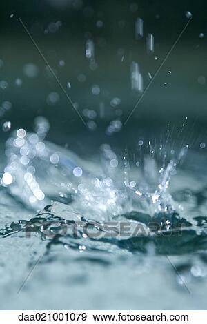 Stock Photo - Water splashing, extreme close-up. Fotosearch