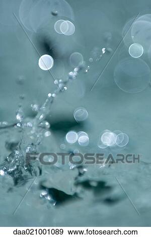 Stock Photo - Water splashing, extreme close-up. Fotosearch