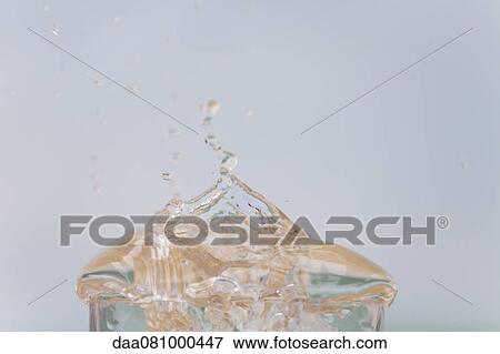 Water splashing out of glass View Large Photo Image Stock Photo - Water splashing out of glass. Fotosearch