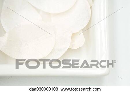 White petals in dish, close-up View Large Photo Image Stock Photo - White petals in dish, close-up. Fotosearch