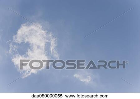 Wispy clouds in blue sky View Large Photo Image Stock Photography - Wispy clouds in blue sky. Fotosearch