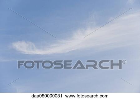 Wispy clouds in sky View Large Photo Image Stock Image - Wispy clouds in sky. Fotosearch
